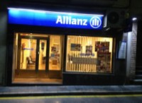Oficina de Allianz Baza. sustitucion de downlight por discos led 20W calido, reduccion del consumo electrico un 71 %